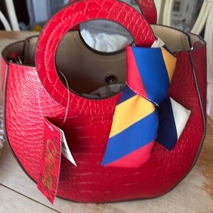 Carlos Santana red faux leather & polyester purse with mini purse attached